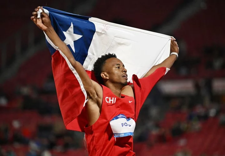Games-Ford claims Pan Am decathlon crown as Chile downs U.S. in soccer